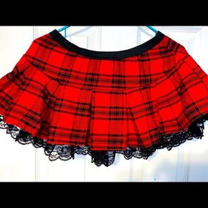 J temptations  red and black black lace bottom pleated mini skirt